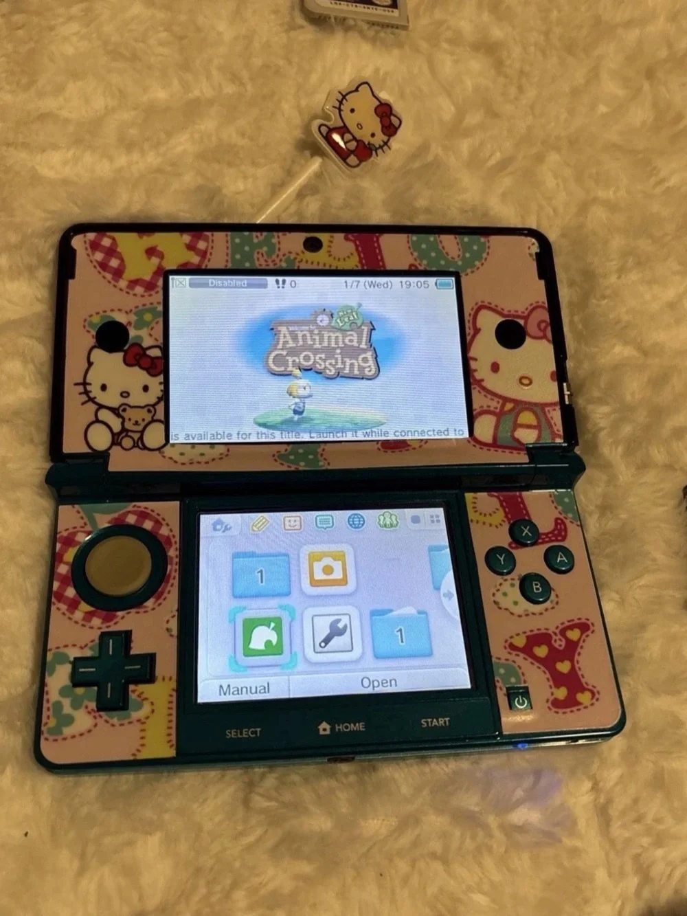 Nintendo Hello Kitty DS Bundle with Blue Handheld & Red-Accented Case